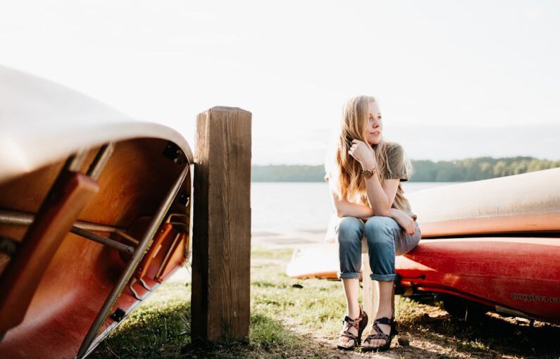 Look Taller Shoes - woman seating on boat