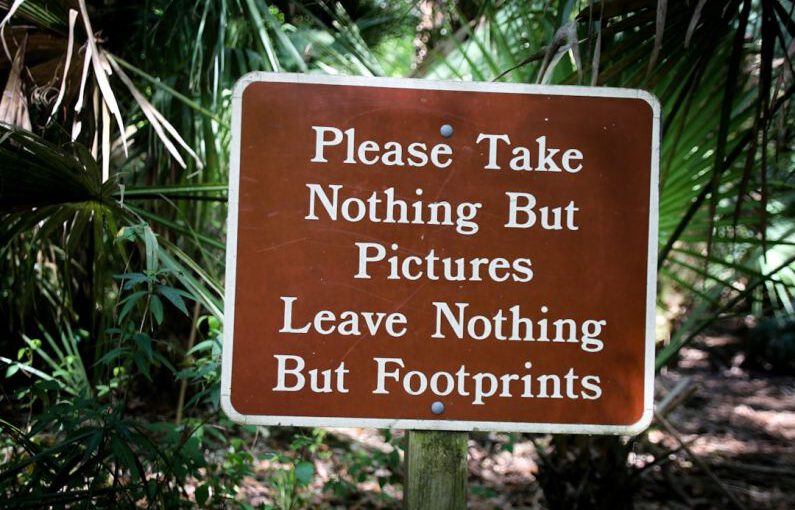 Eco-friendly Shoes - a sign warning people not to take pictures