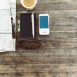 Shoe Storage - pen beside mobile phone on wooden surface